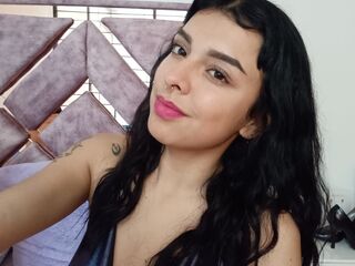 hot cam girl fingering shaved pussy AndreaWeins